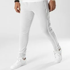 Meilleure affaire ✔️ Pantalon Jogging A Bandes GT6644 Gris Clair de Adidas Performance ⭐
