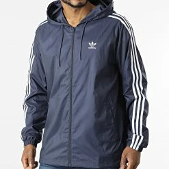 Vente flash 👍 Coupe-vent Capuche Adicolor 3 Stripes HB9491 Bleu Marine de Adidas Originals 💯
