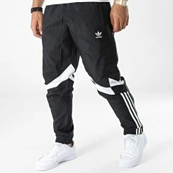 Budget ⌛ Pantalon Jogging A Bandes HK7325 Noir de Adidas Originals 😍