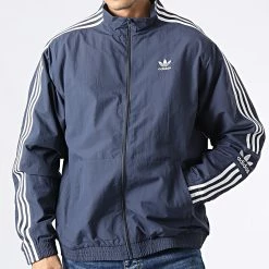 Les meilleures critiques de 💯 Veste Zippée A Bandes Lock Up HC2000 Bleu Marine de Adidas Originals 🎁