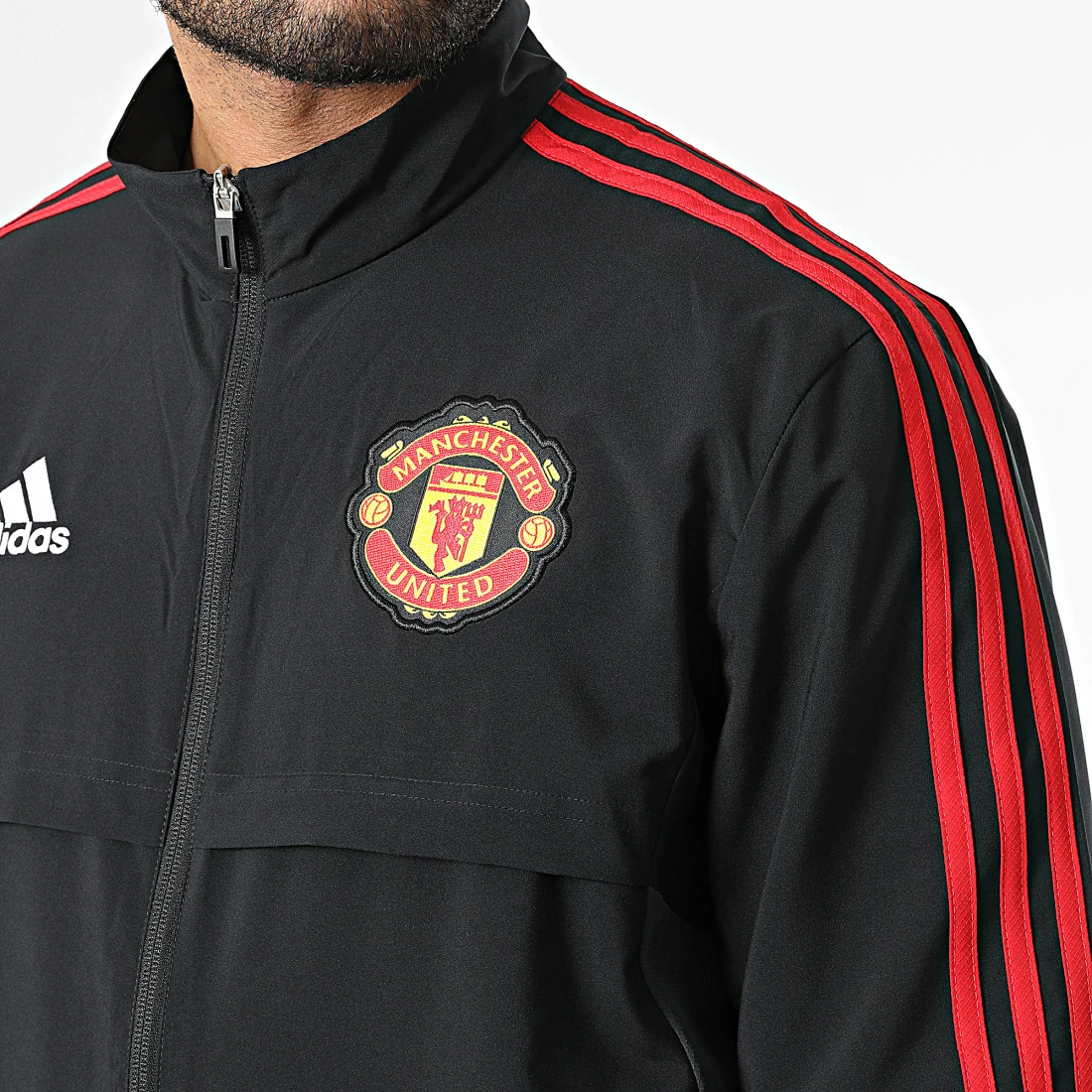 Offres 🌟 Veste Zippée A Bandes Manchester United FC H64037 Noir de Adidas Performance ⭐ 4 Offres 🌟 Veste Zippée A Bandes Manchester United FC H64037 Noir de Adidas Performance ⭐ – Image 2