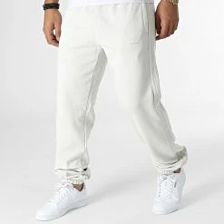 Top 10 🌟 Pantalon Jogging A Bandes HK2728 Beige de Adidas Originals 🧨